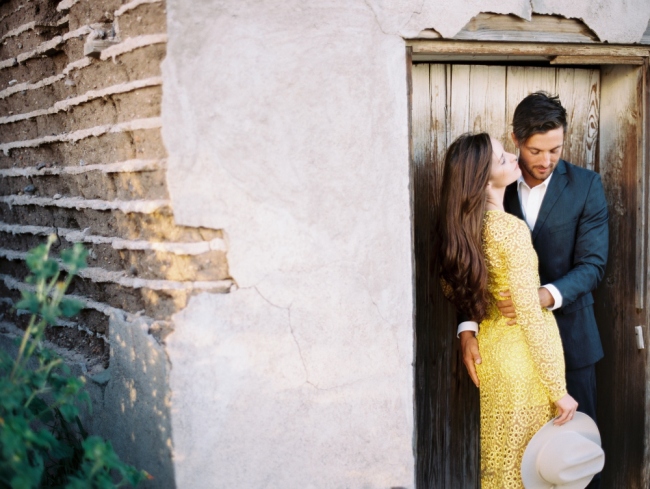 Man and woman in yellow dress marfa elopement
