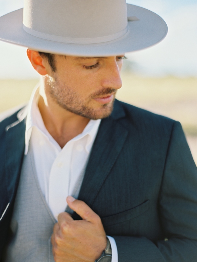 Man in grey suit and stetson 