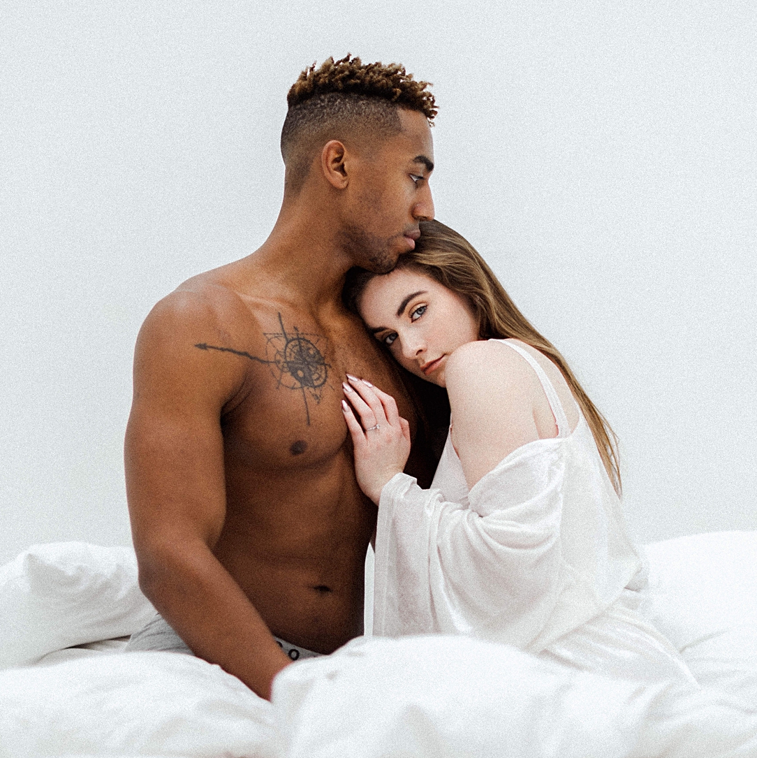 Couple in bed boudoir