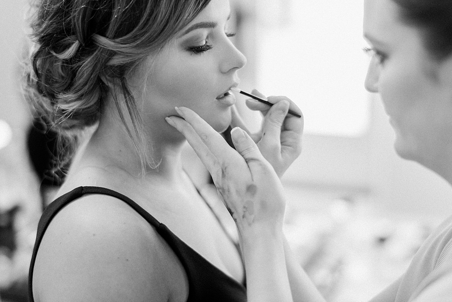girl getting makeup done