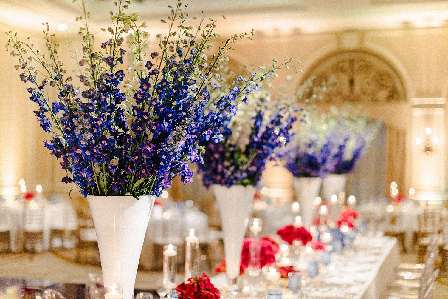 wedding reception table blue centerpiece flowers