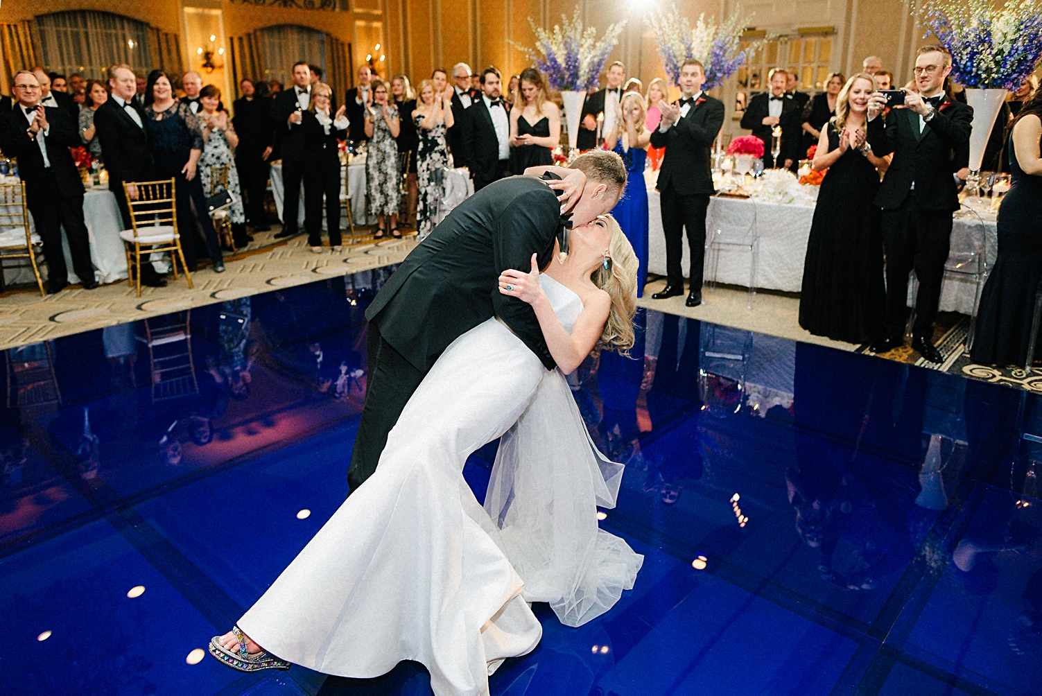 adolphus hotel wedding reception couple dancing dip kiss