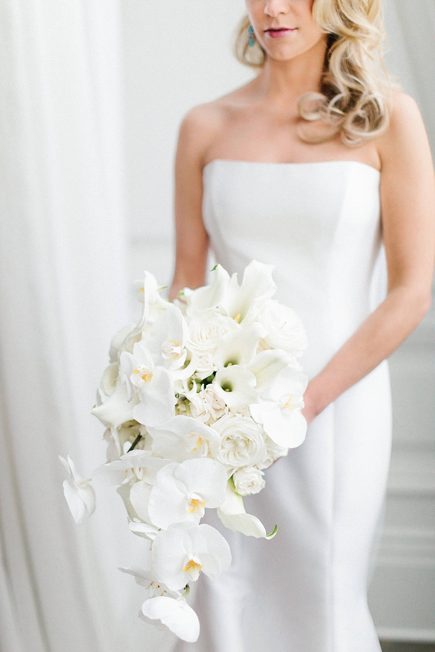 white orchid bridal bouquet Adolphus Hotel wedding 