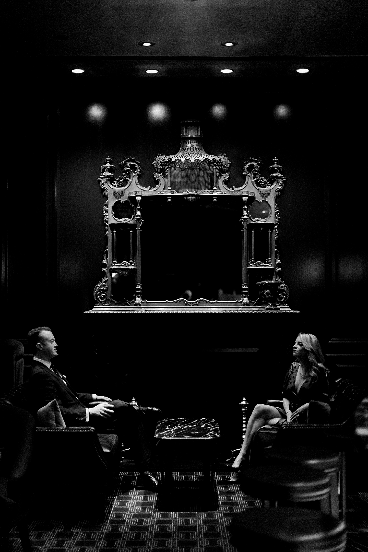 Adolphus Hotel engagement bar fireplace black and white