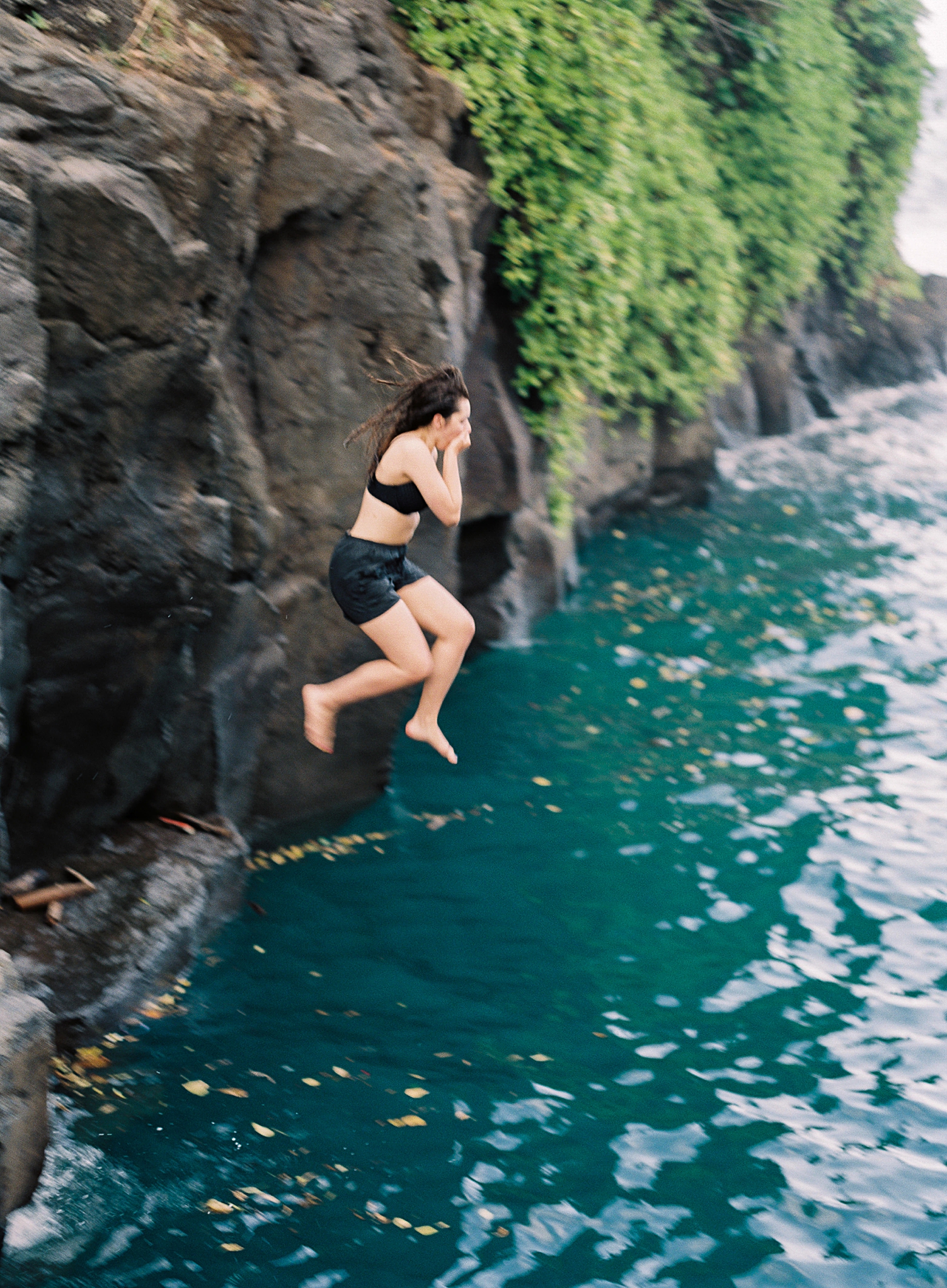 cliff diving at blue lagoon on road to Hana Maui