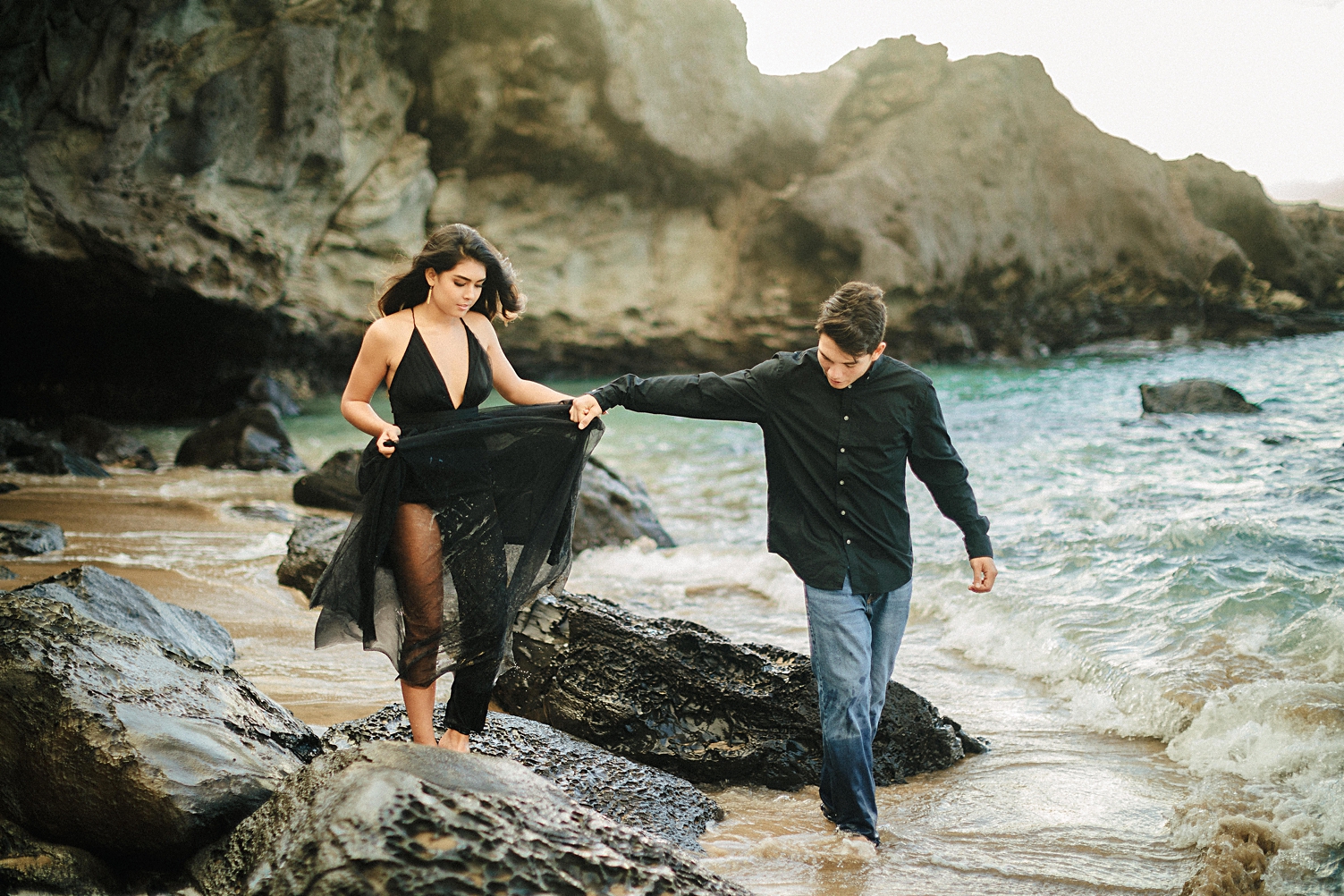 Hawaii beach engagement session couple walking