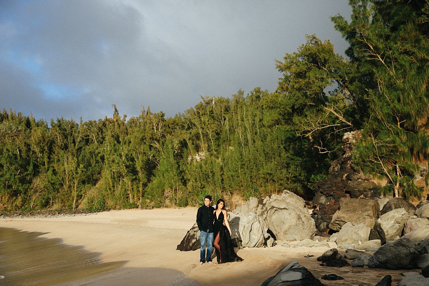 couple engagement on maui beach black dress 