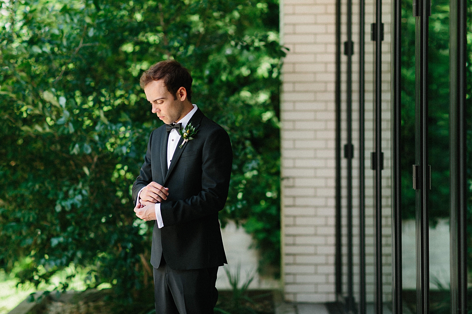 Groom in tuxedo at South Congress Hotel Austin