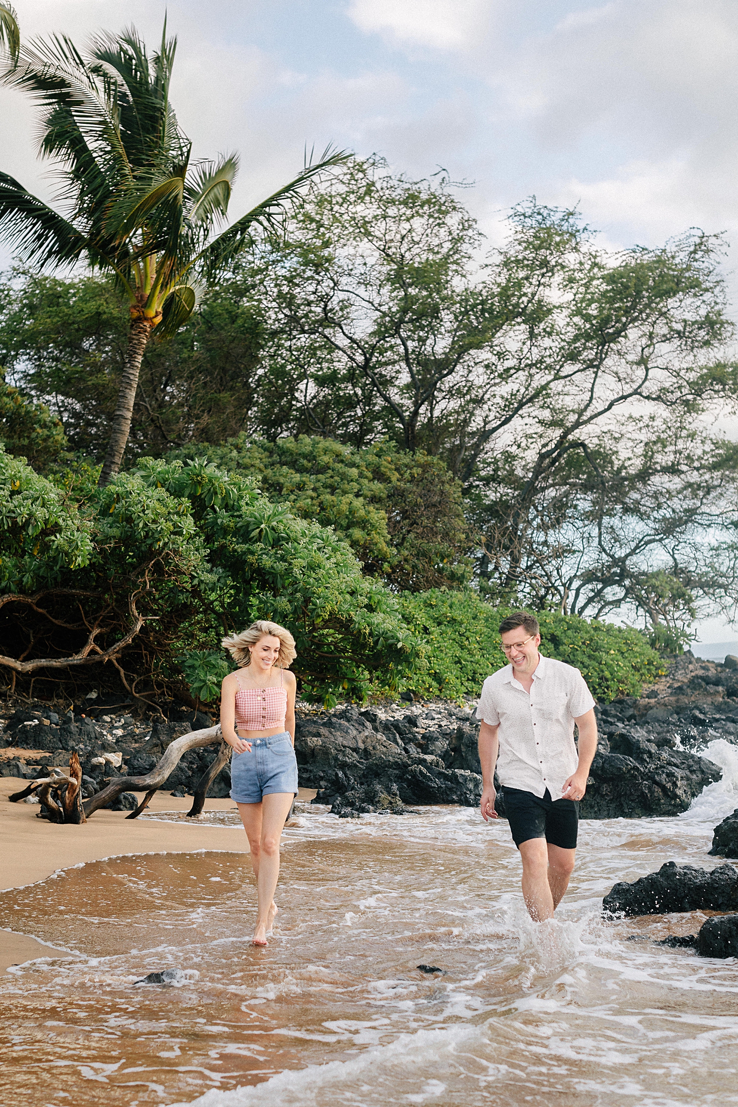 couple running on Kihei beach Hawaii