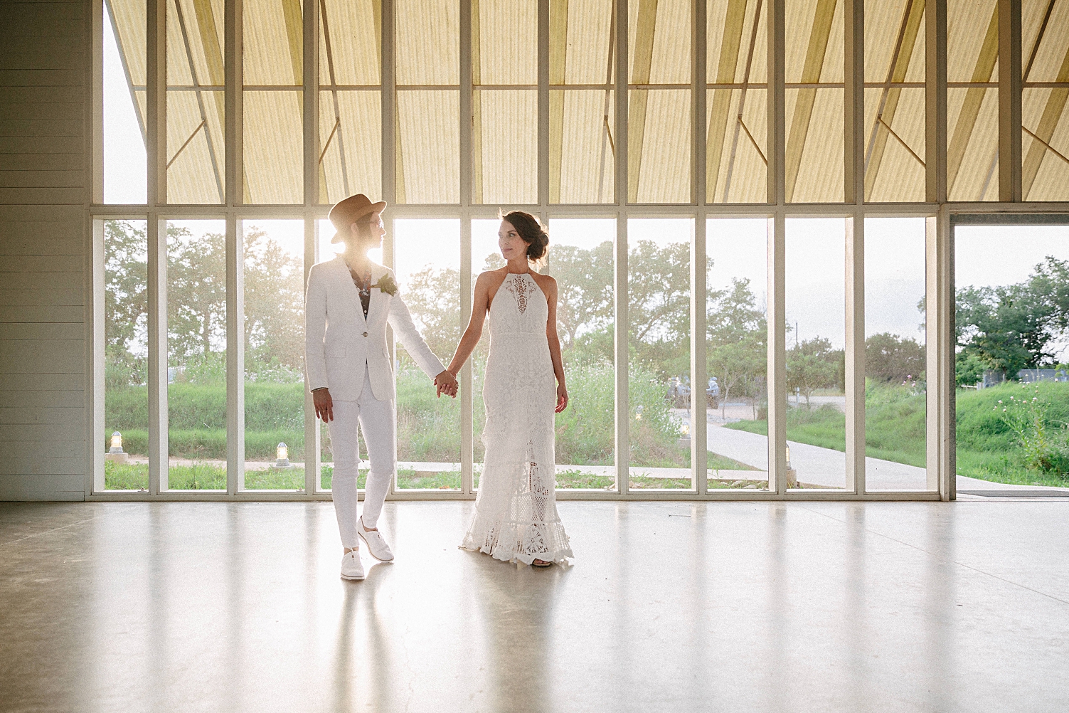 prospect house wedding holding hands dripping springs