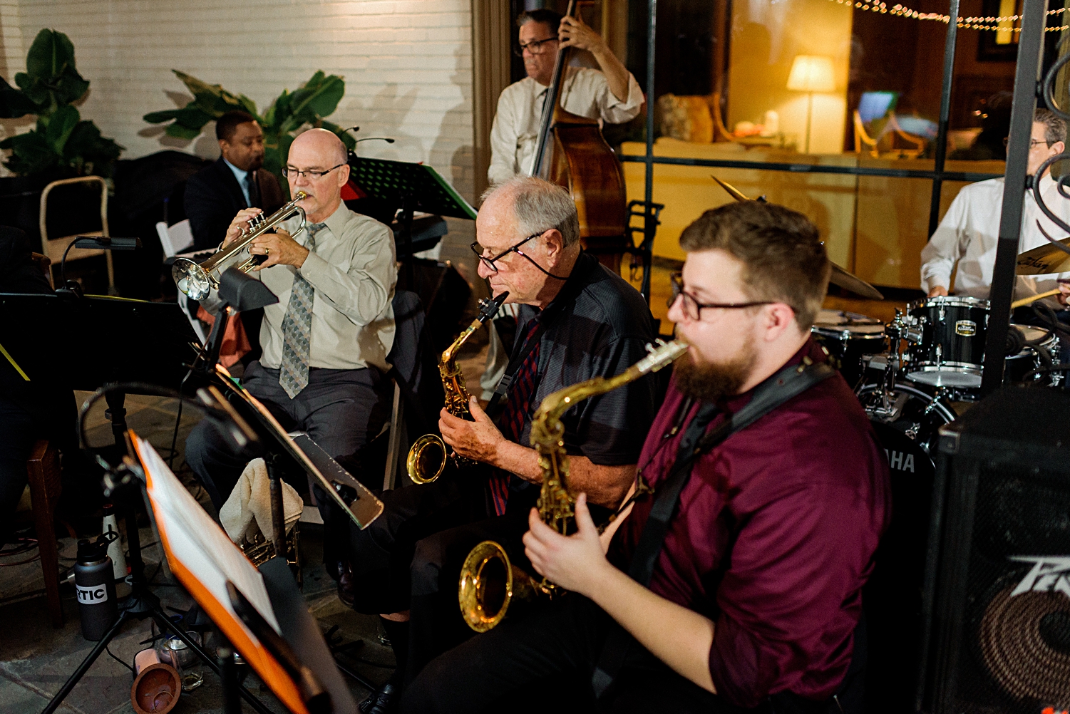 band horn section playing at wedding reception