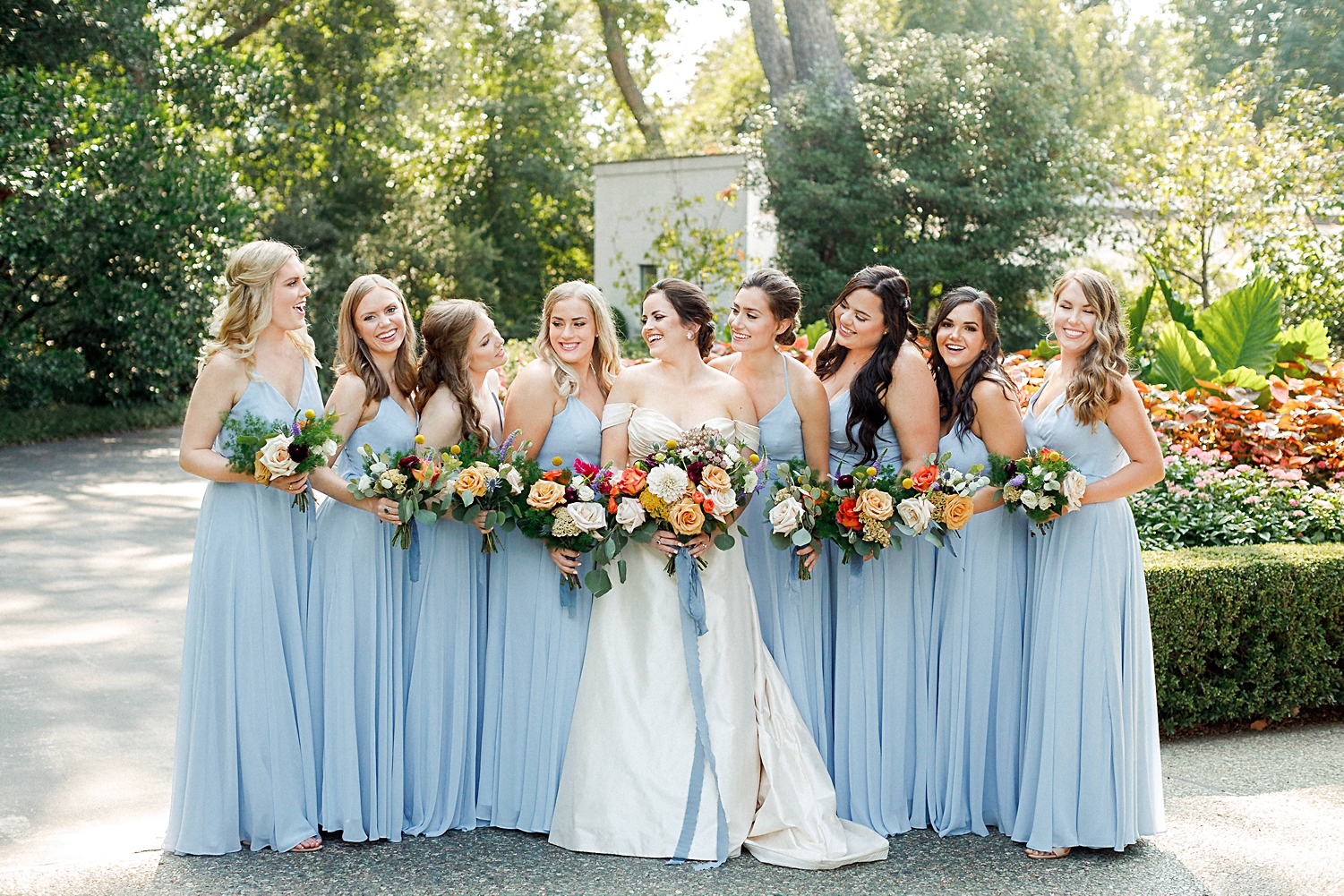 bride and bridesmaids blue dresses colorful wedding dallas arboretum