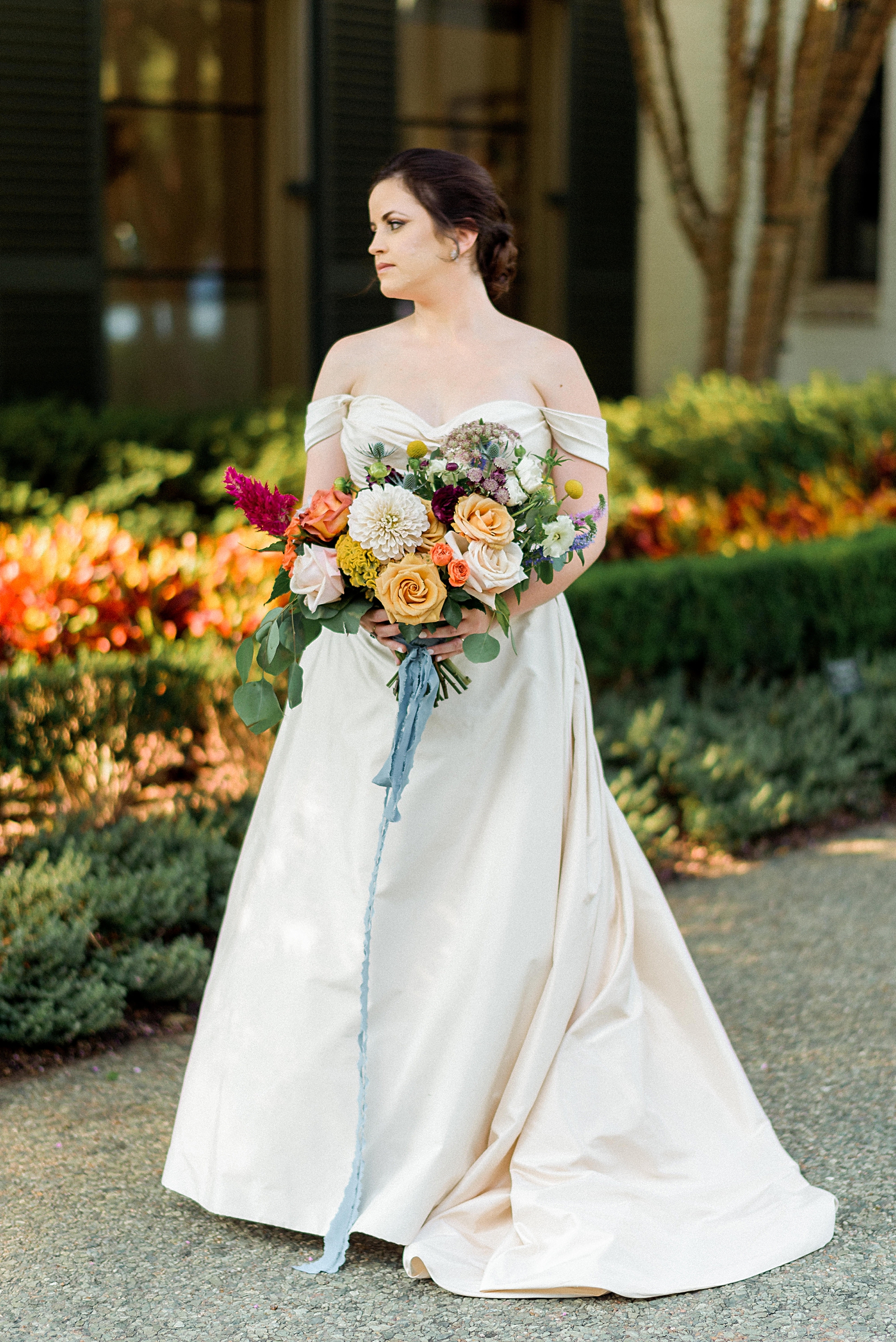 bride with bouquet colorful wedding dallas arboretum