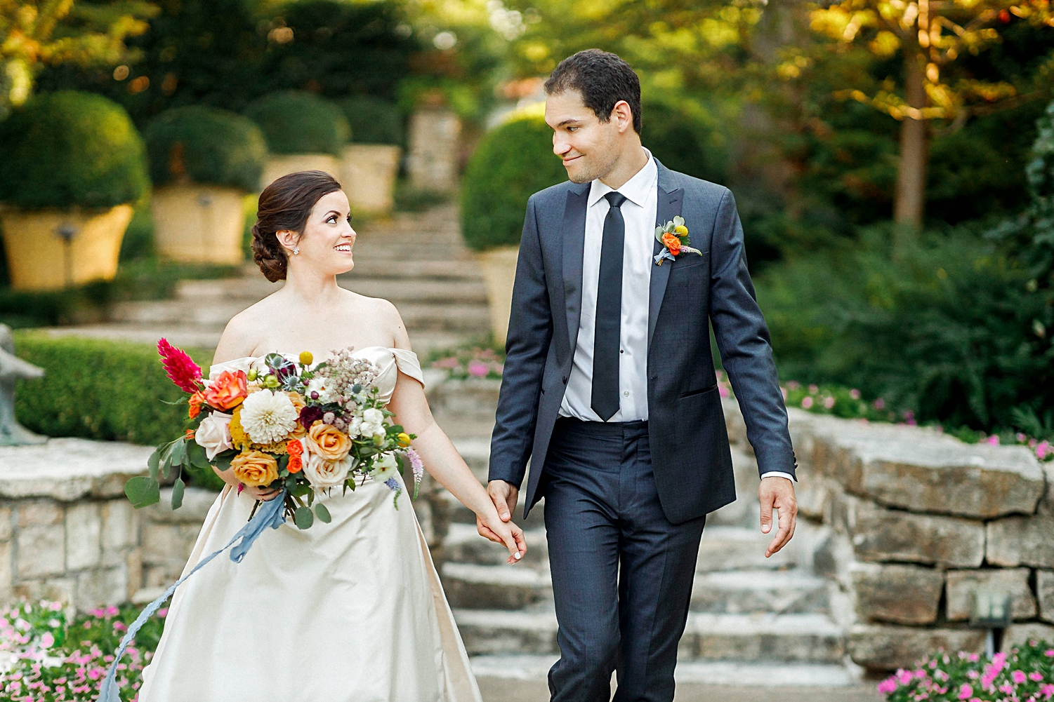 bride and groom Dallas arboretum colorful wedding Garden bouquet walking