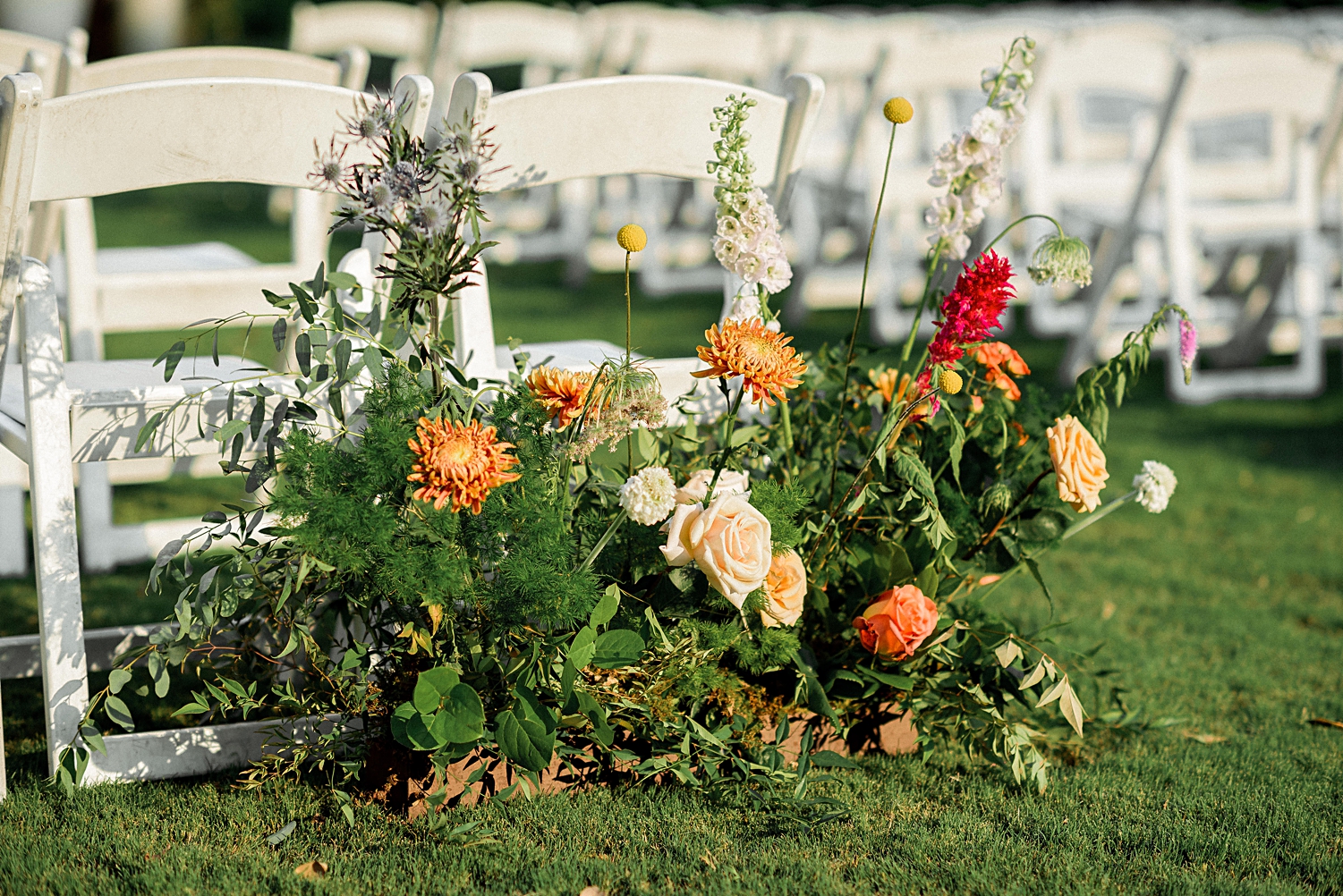 dallas arboretum wedding ceremony aisle florals