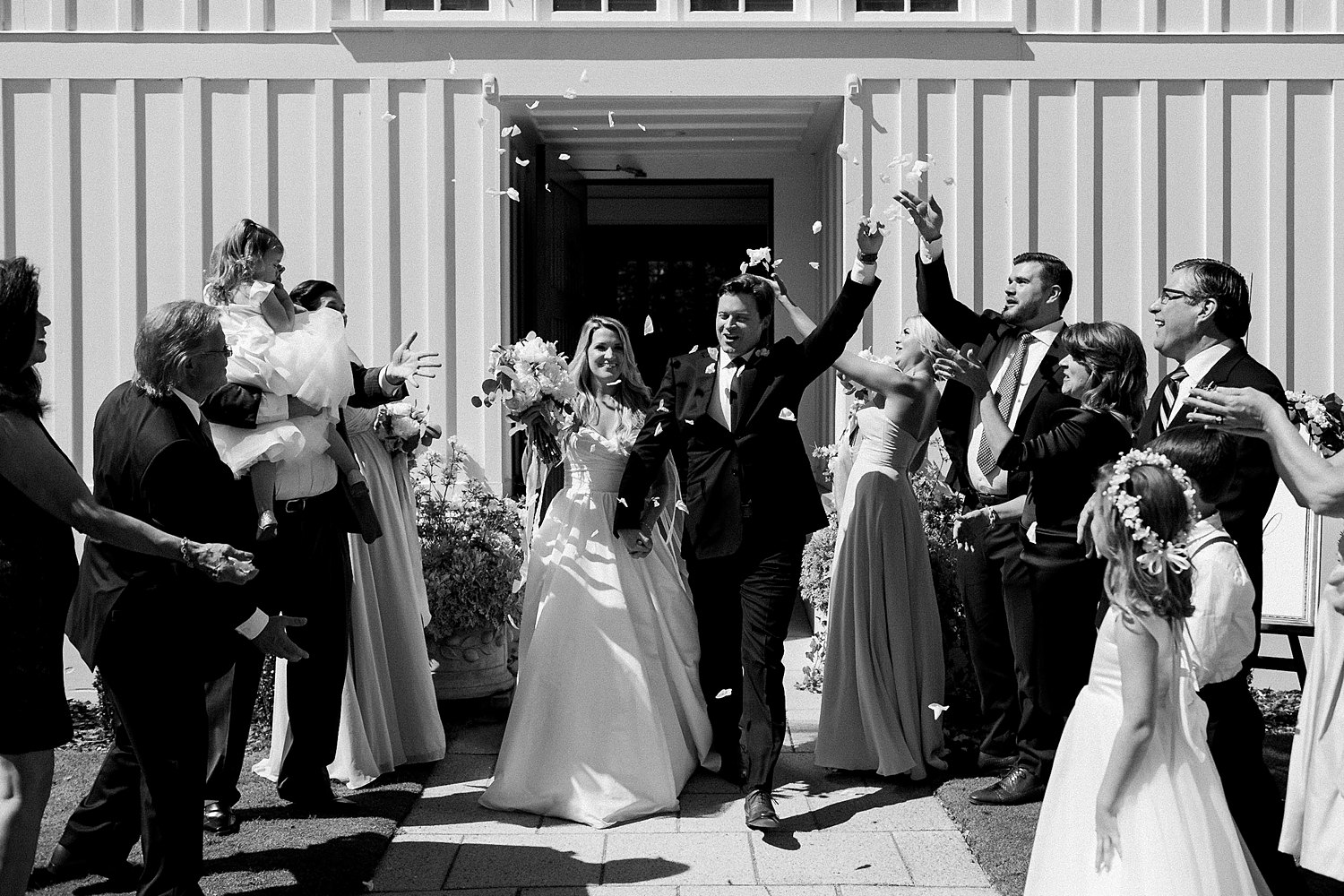 Seaside Chapel Florida wedding ceremony exit celebration flower petals