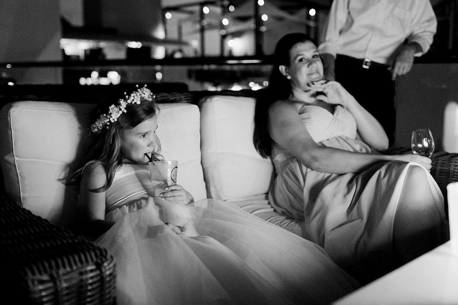 The Pearl Hotel wedding Florida flower girl sitting by fire at night