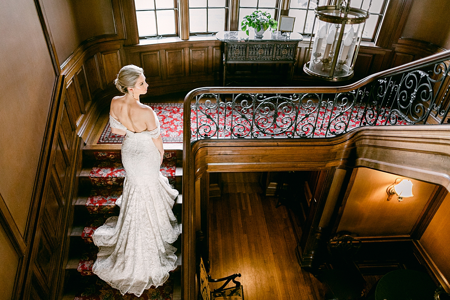 Bride standing on wooden staircase during Dallas bridal session