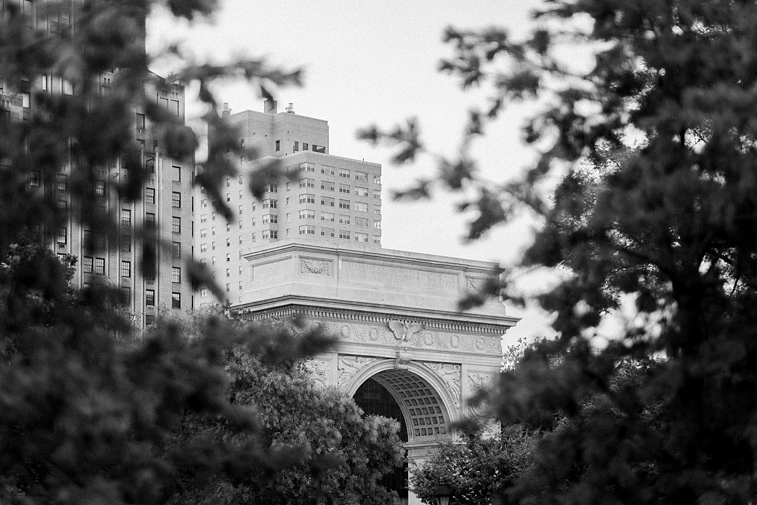 Washington Square Park Arch from behind trees