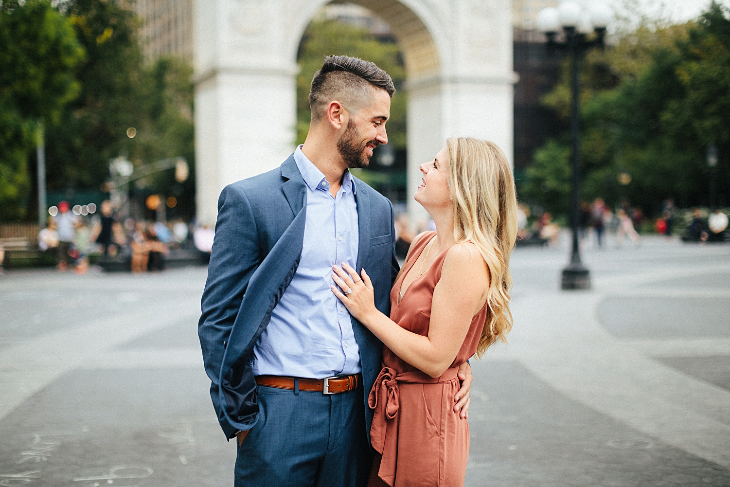 couple embracing in greenwich village engagement