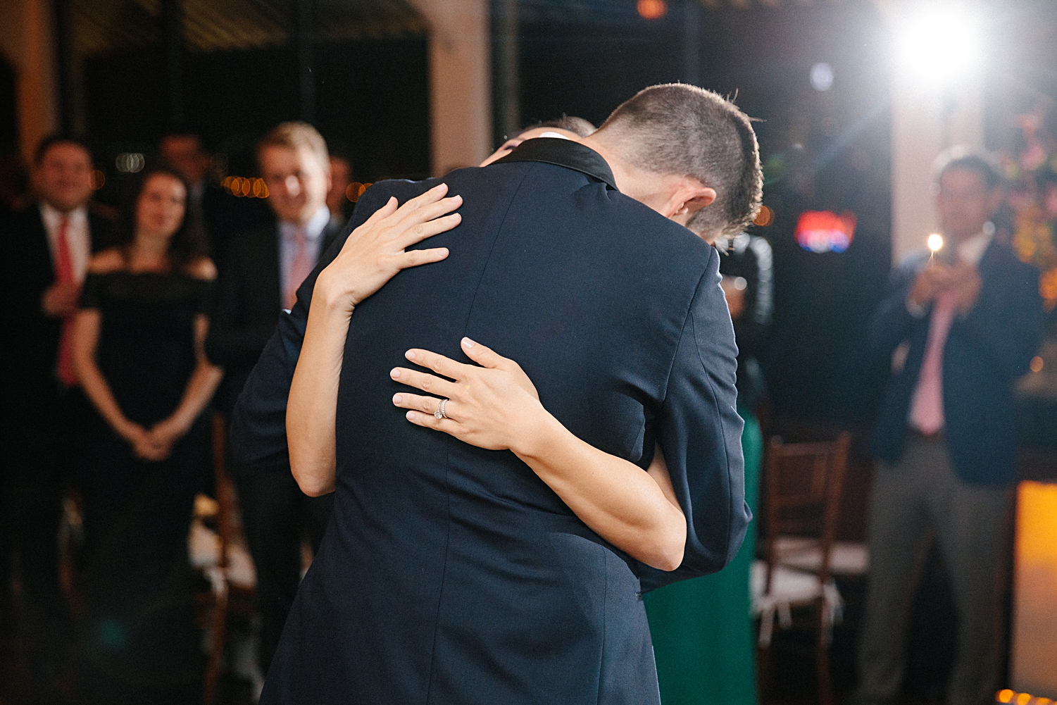 bride and groom hugging after first dance at wedding reception at water club new york city