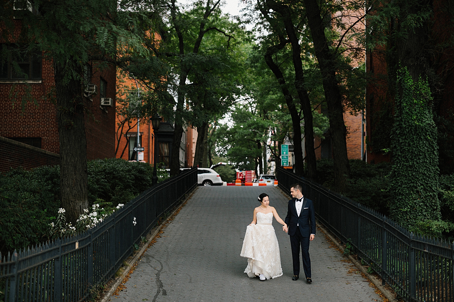 bride and groom holding hands walking in Brooklyn Heights new york city wedding