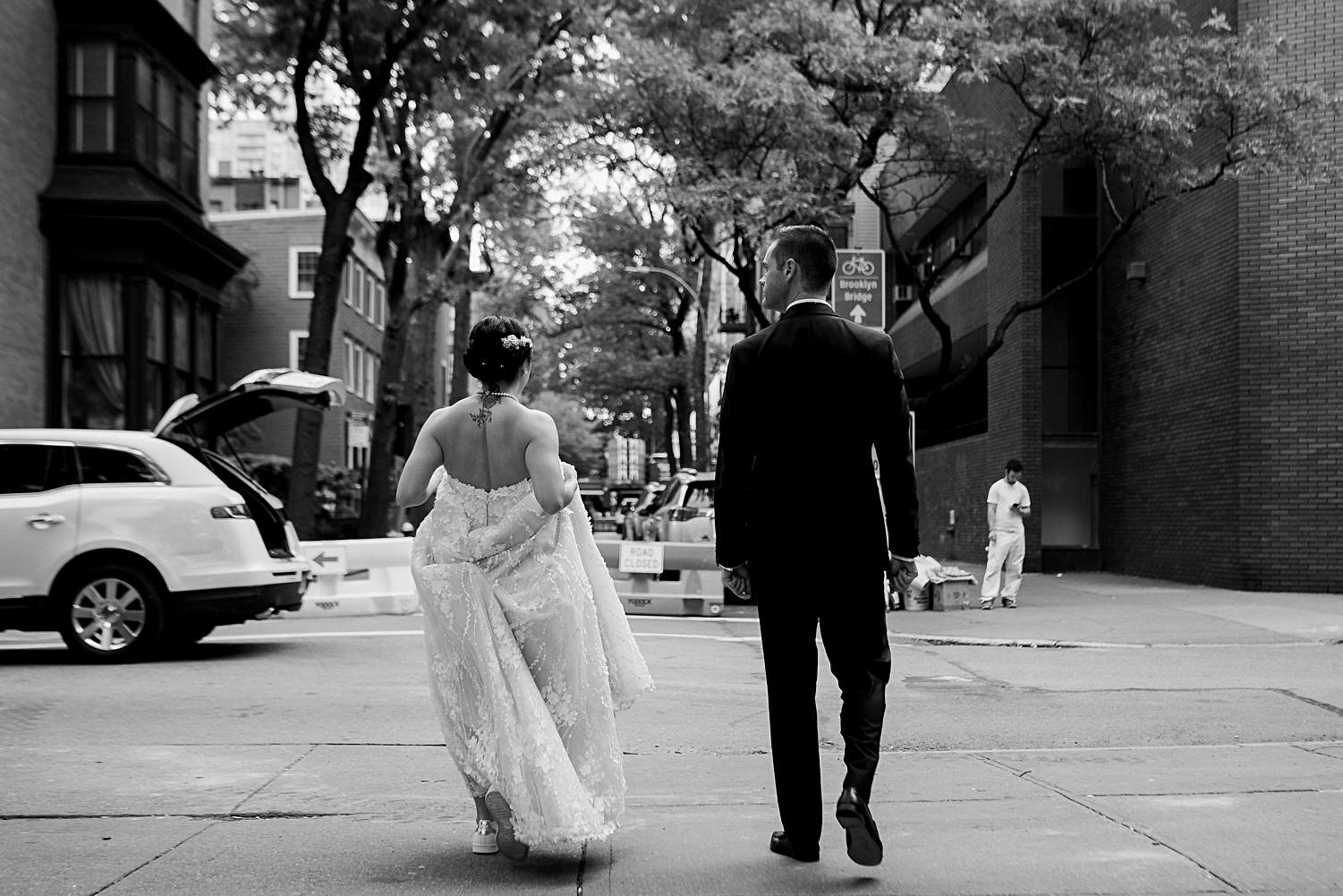 bride and groom walking down brooklyn heights street