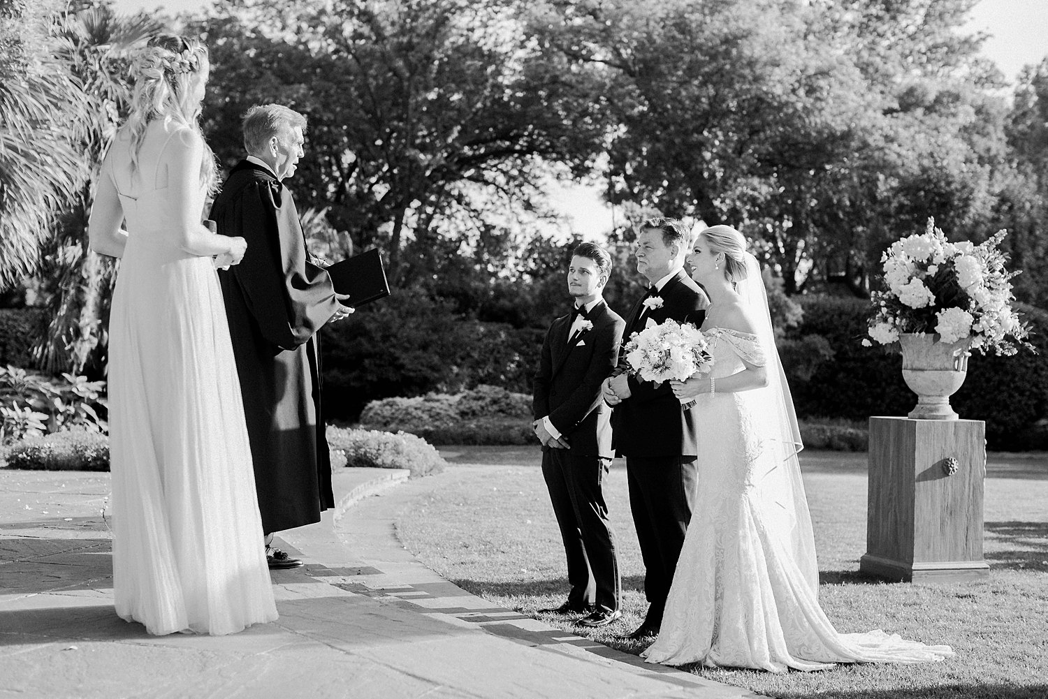 Father and Bride standing with groom at altar Dallas Arboretum wedding ceremony