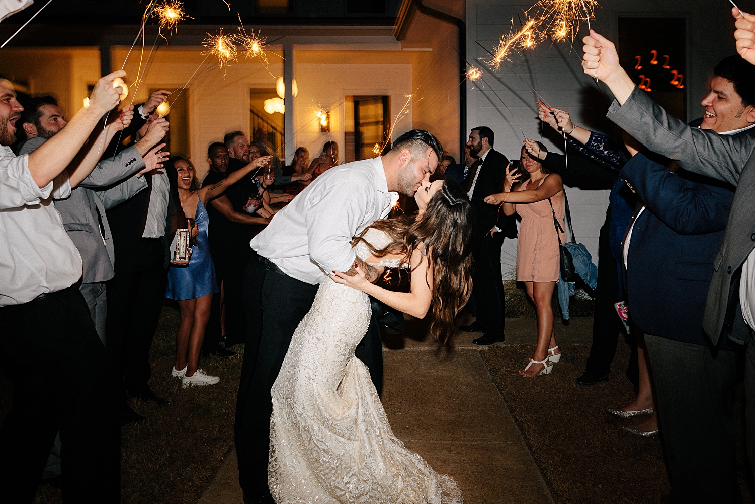 sparkler exit bride and groom kiss dip Emerson Venue Wedding