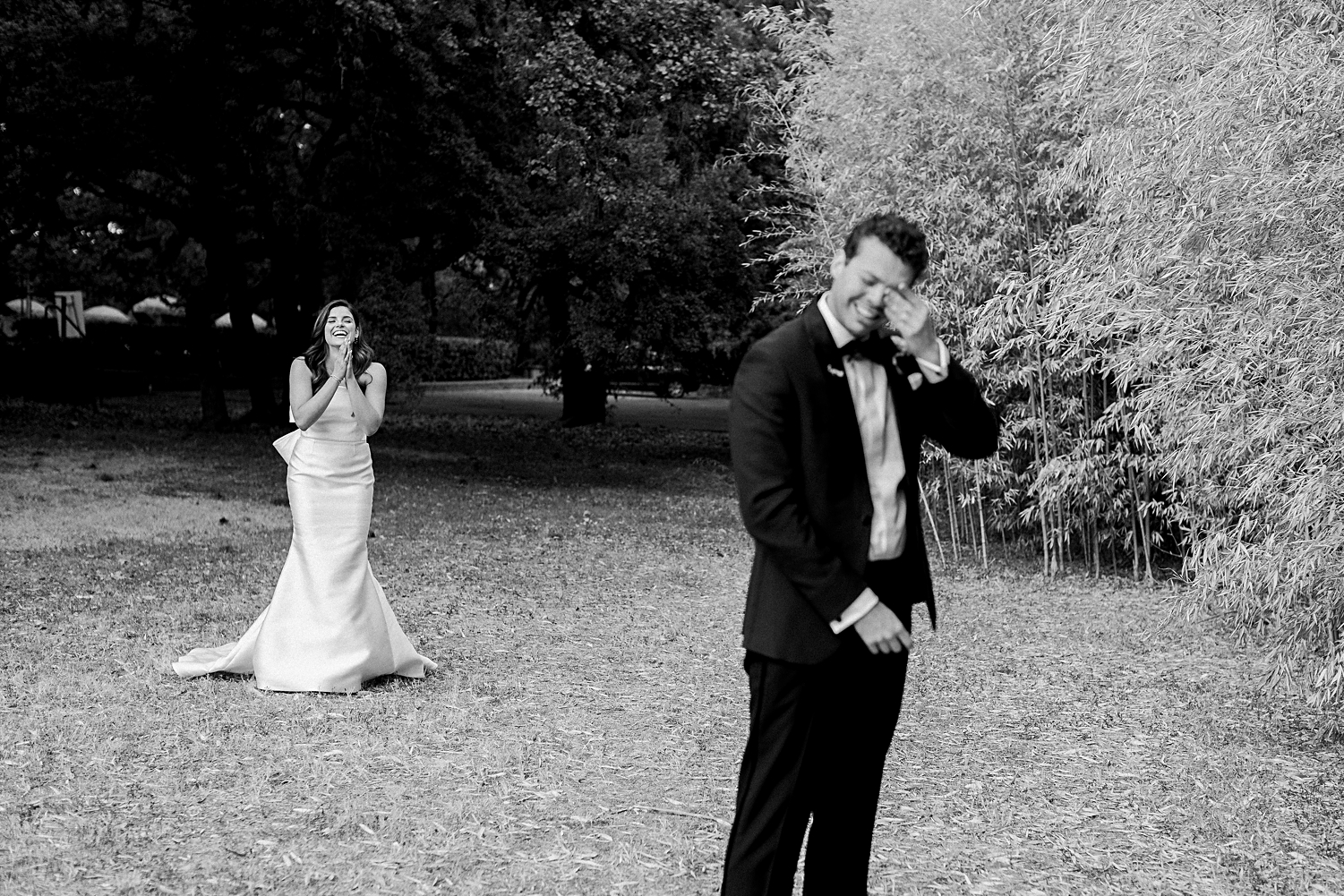 bride approaching groom from behind wedding first look crying black and white Mattie's At Green Pastures
