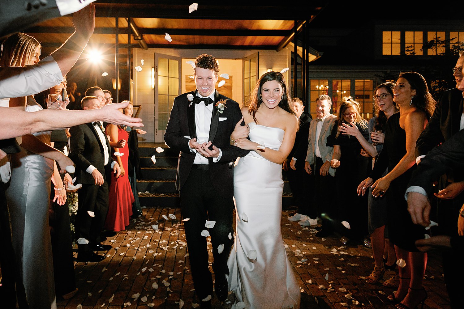 bride and groom flower petal toss reception exit matties wedding venue austin