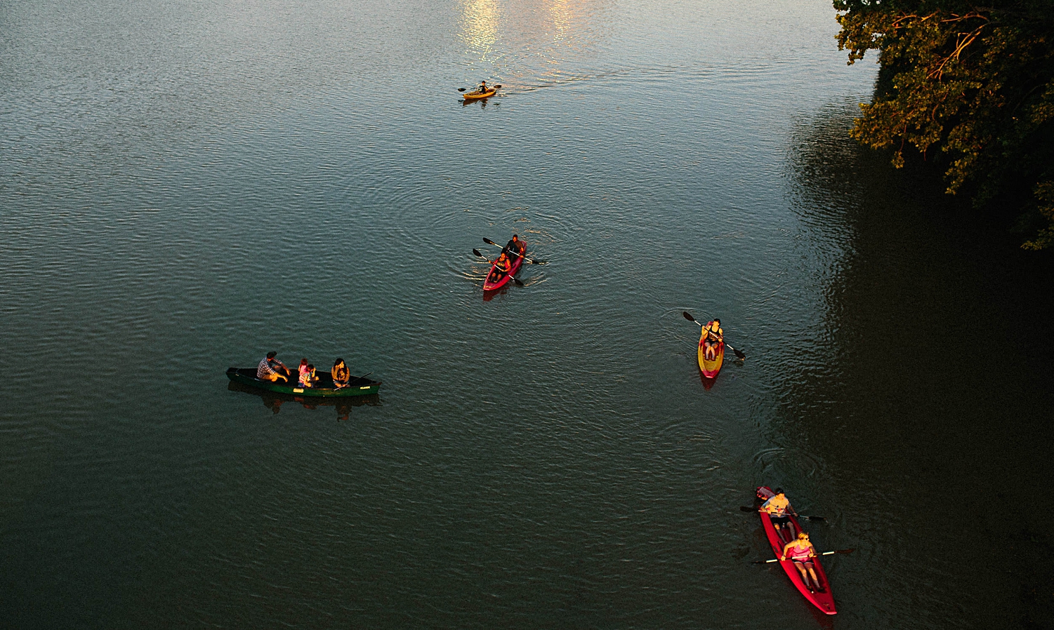 Kayakers in water Austin Texas orange