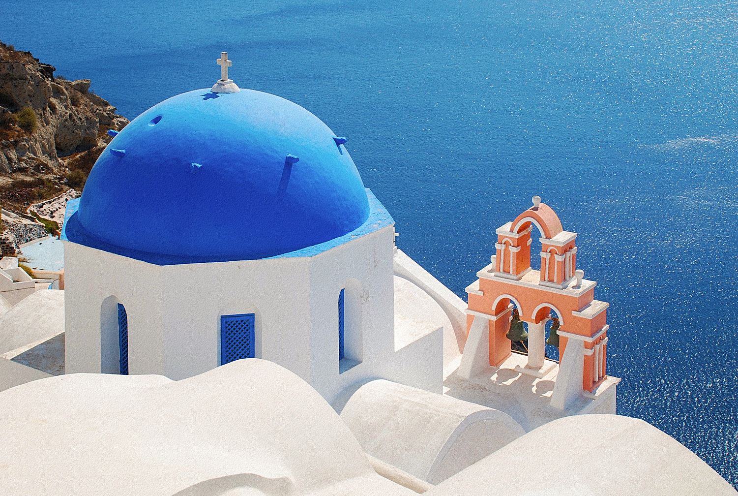 Greece wedding venues blue dome church Santorini sea peach bell arch