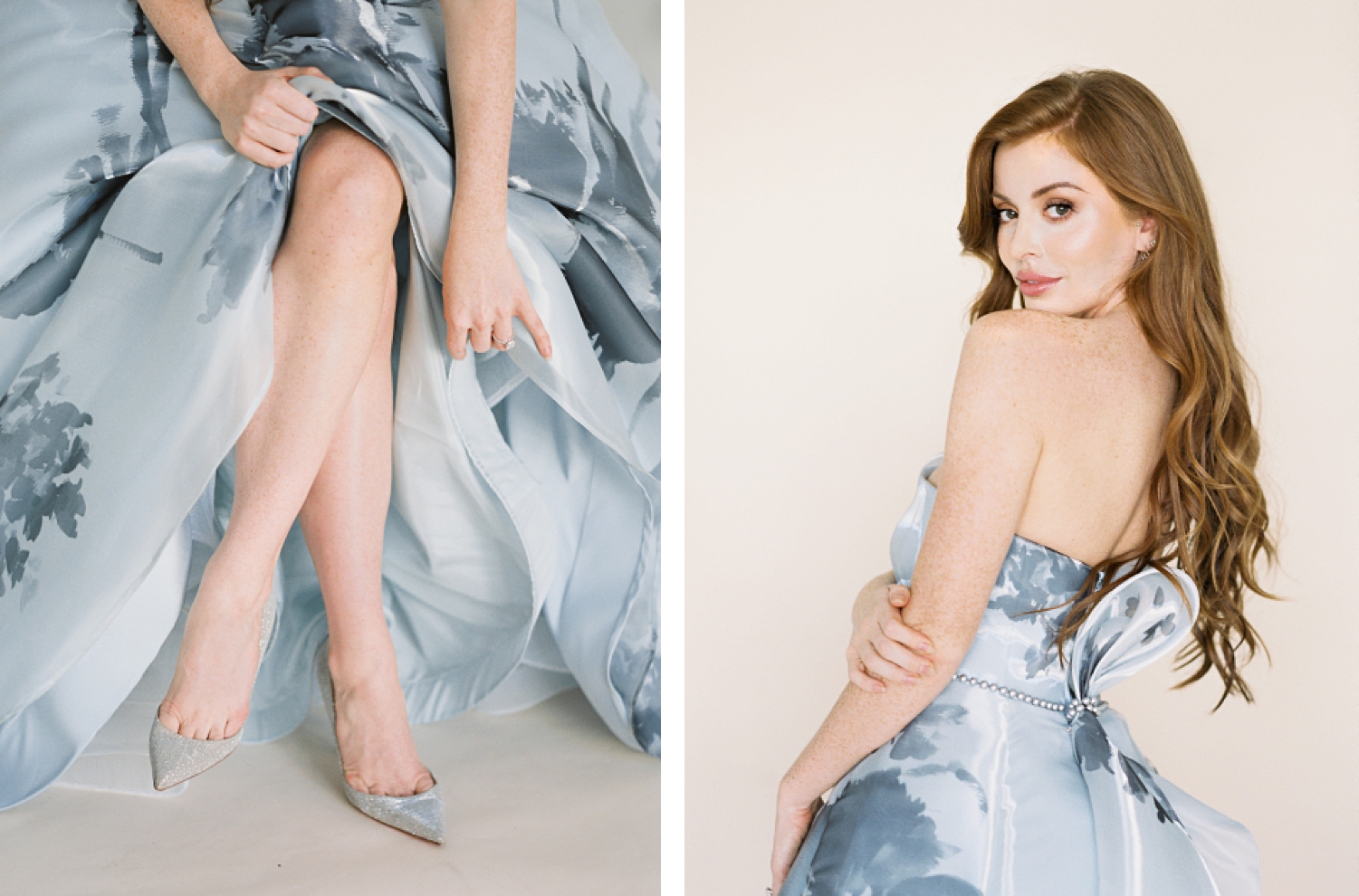 Blue floral ball gown worn by redhead woman legs crossed silver shoes