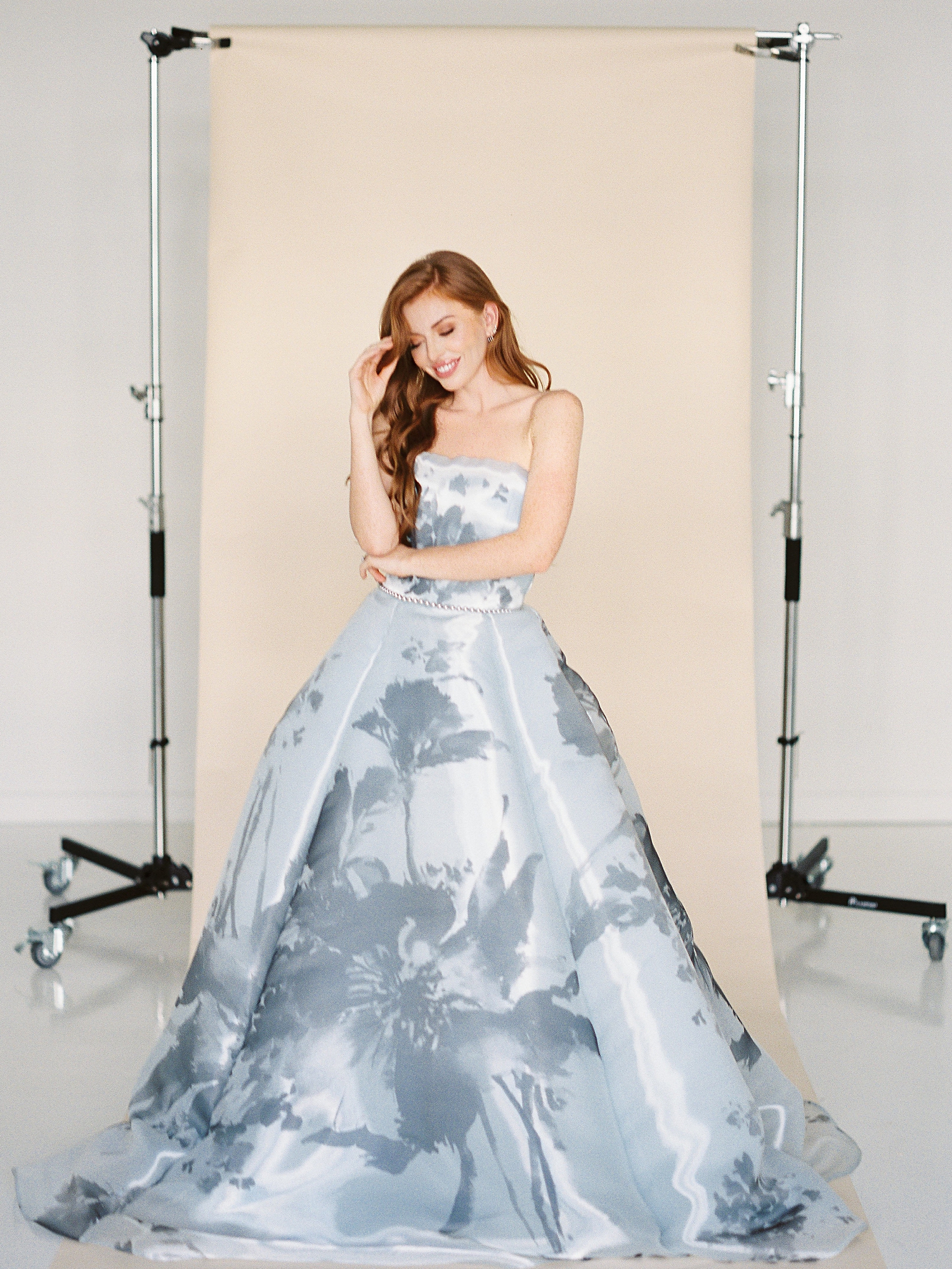 Blue floral ball gown worn by redhead girl