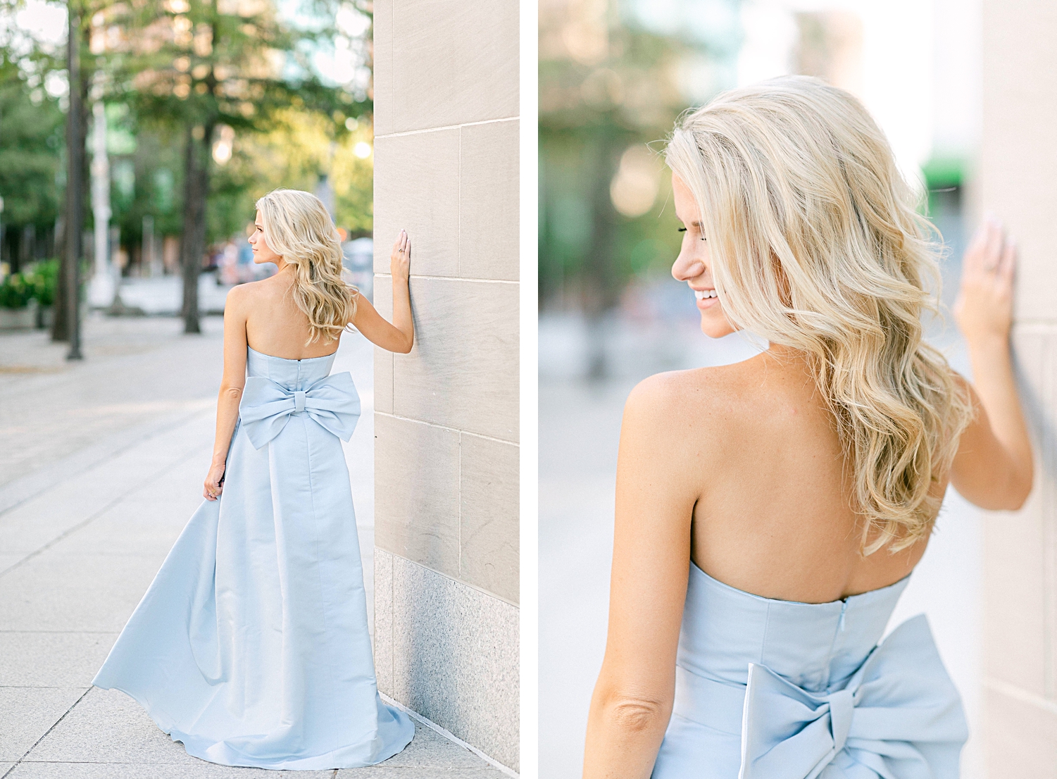blonde woman in light blue jumpsuit with skirt and big bow on back leaning on stone wall in downtown Dallas arts district