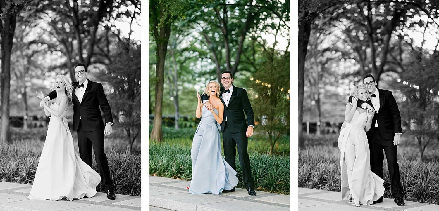 Man in black tuxedo and woman in light blue jumpsuit dancing spinning by green garden in downtown Dallas engagement