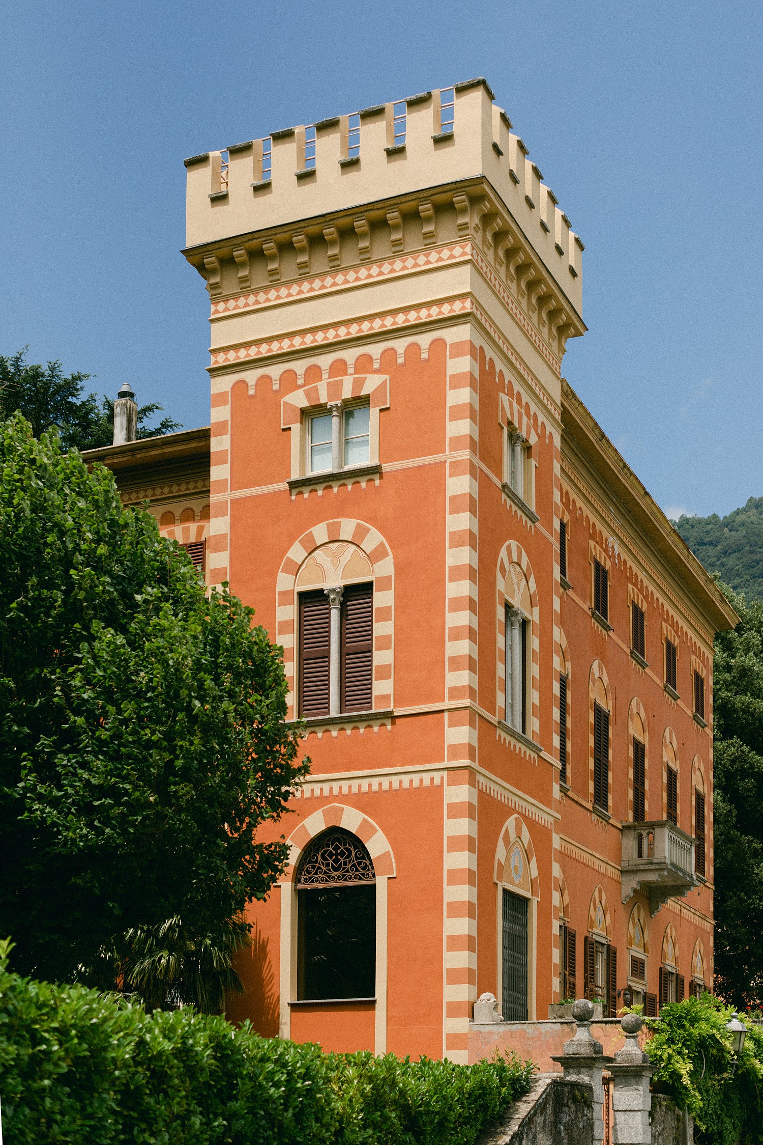 yellow and orange face of three story Italian Villa Lake Como