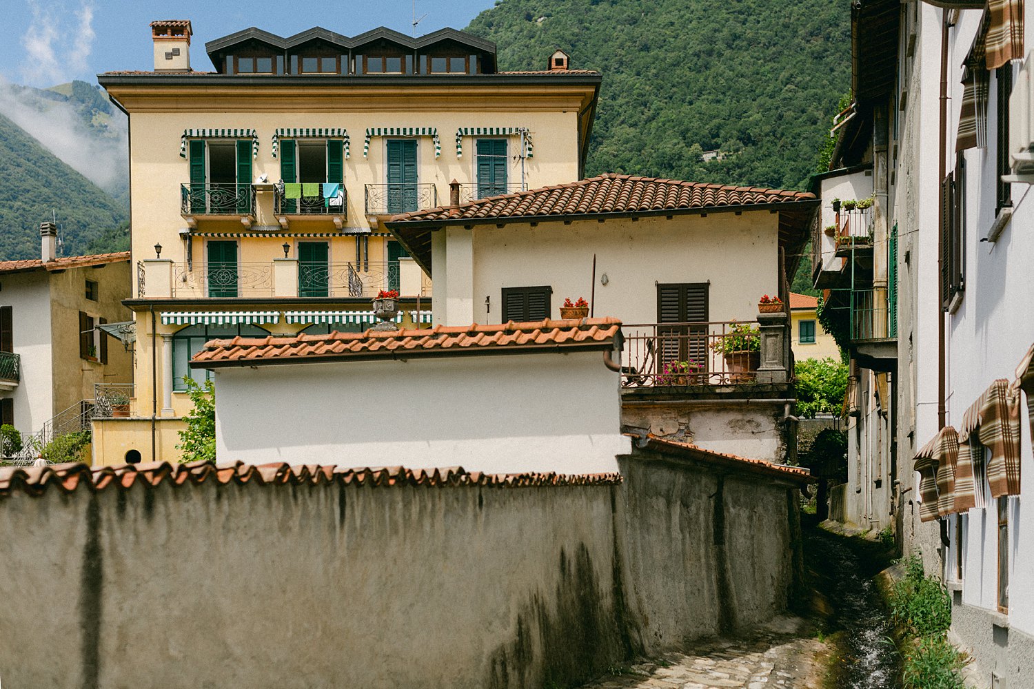 yellow Italian home in village Italy