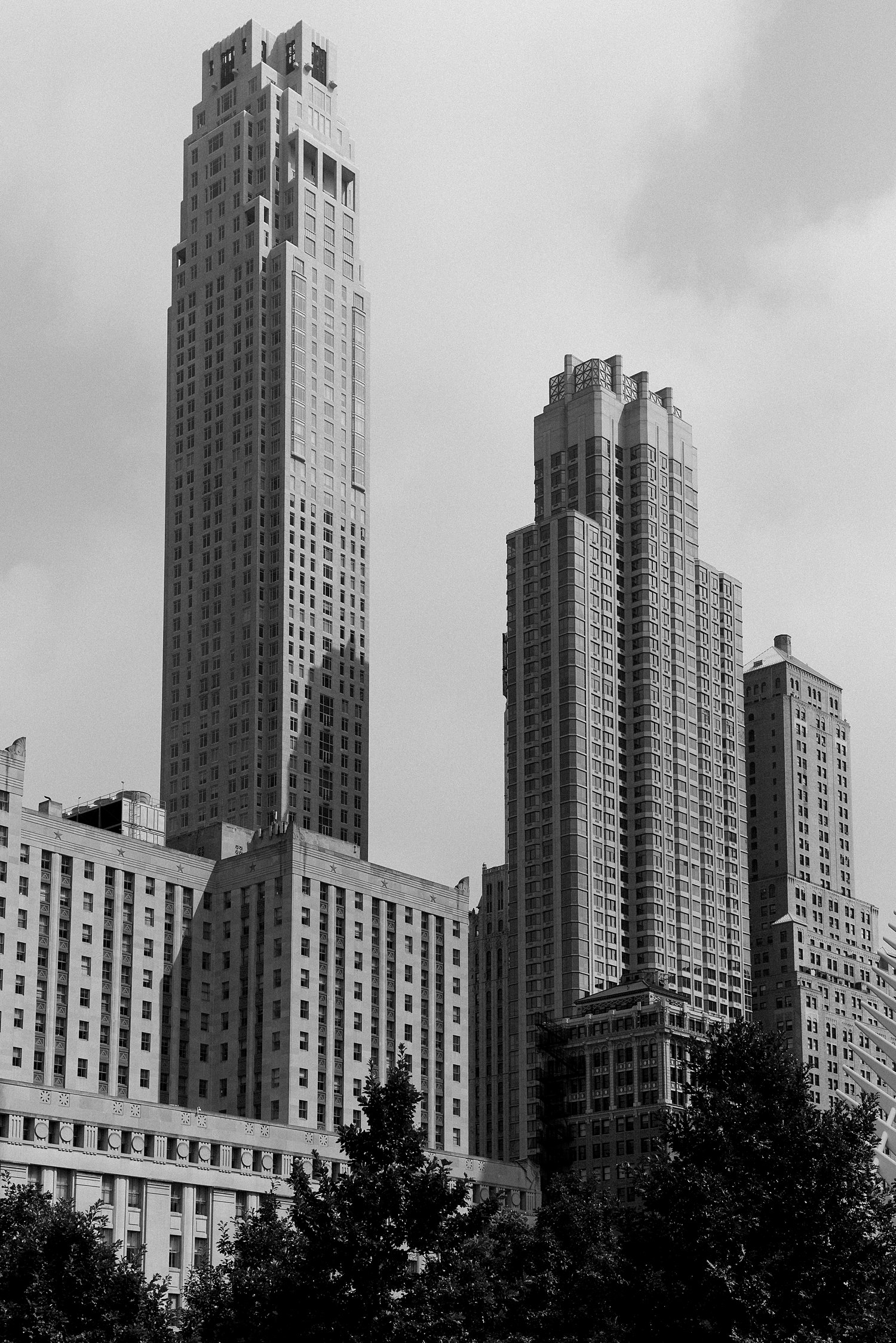skyscrapers in downtown Manhattan street scene black and white places to visit in new york