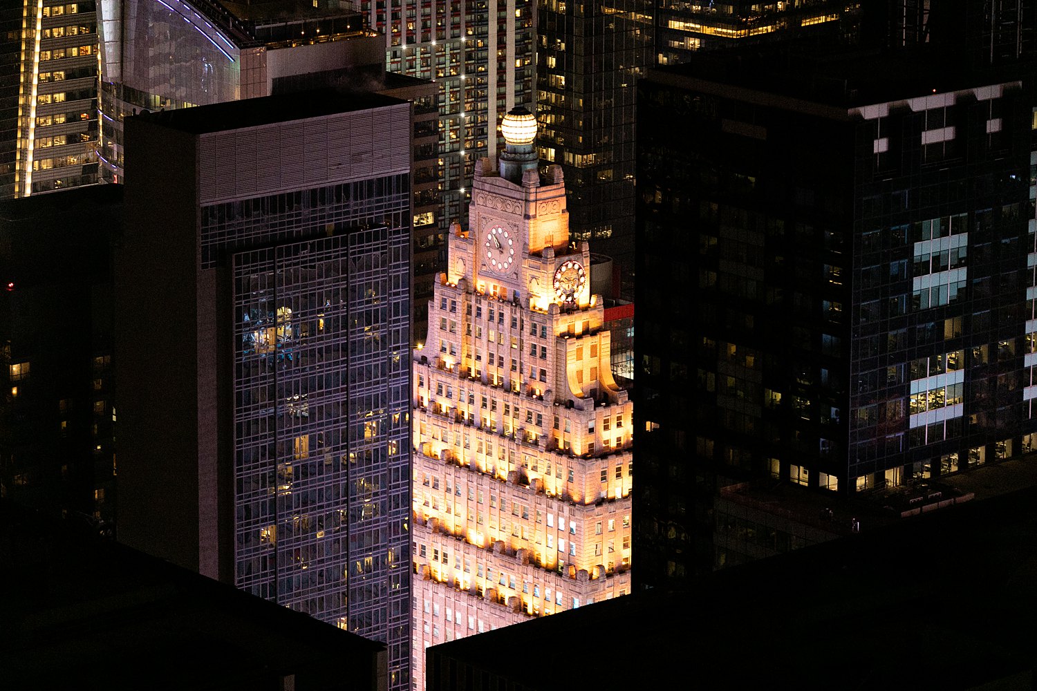 Times square building at night illuminated NYC places to visit in new york