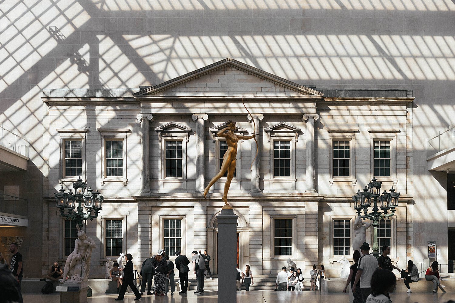 American wing of the Metropolitan Museum of Art in New York City as shadows are cast MET NYC