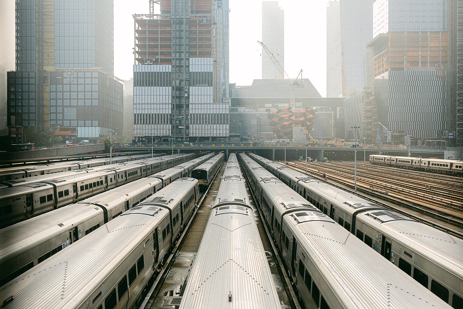 Hudson yards trains against skyline Manhattan NYC places to visit in New York