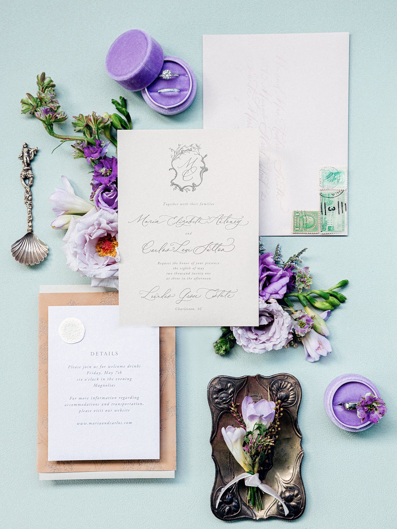 Purple and green wedding paper flat lay