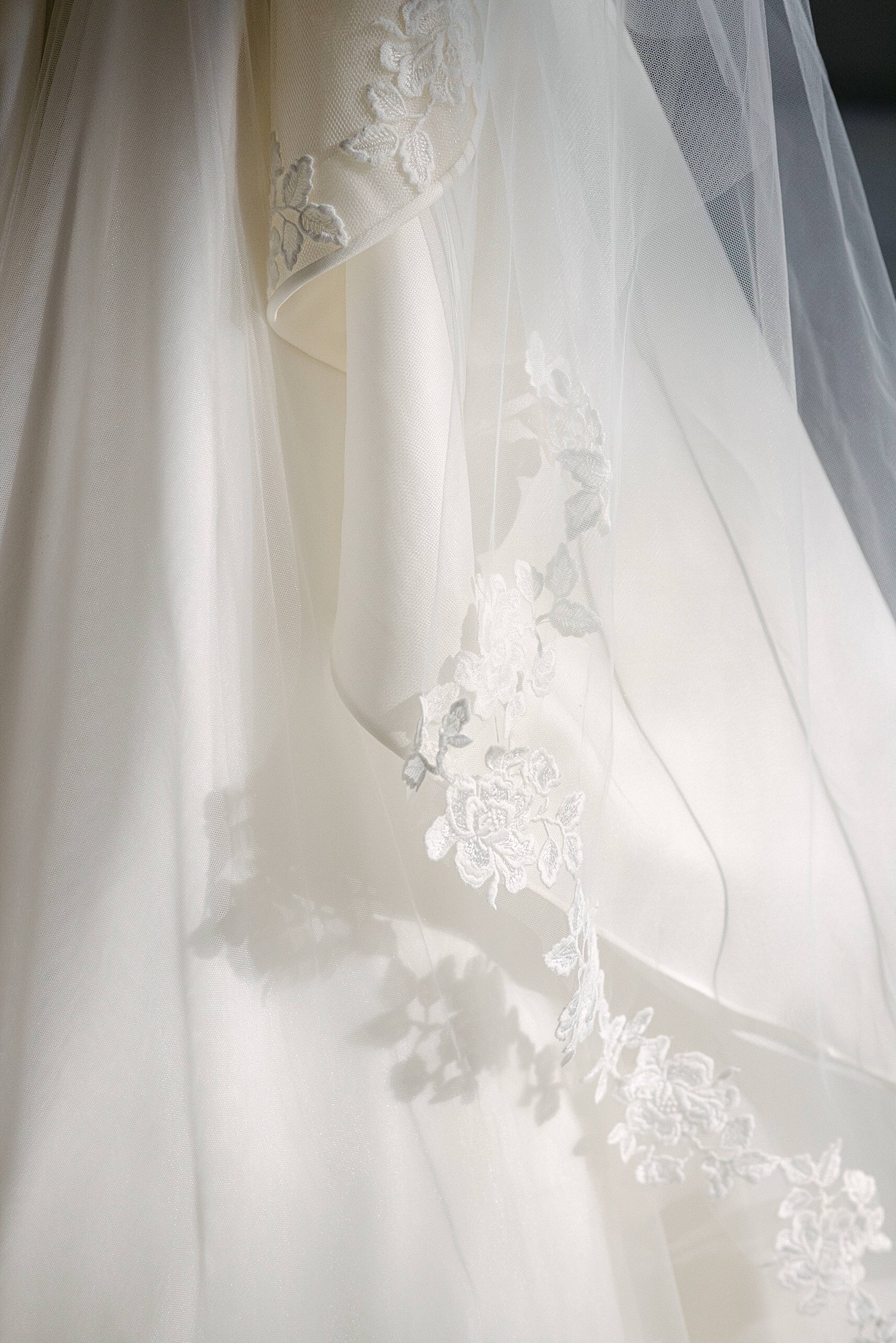 white wedding dress and veil shadows