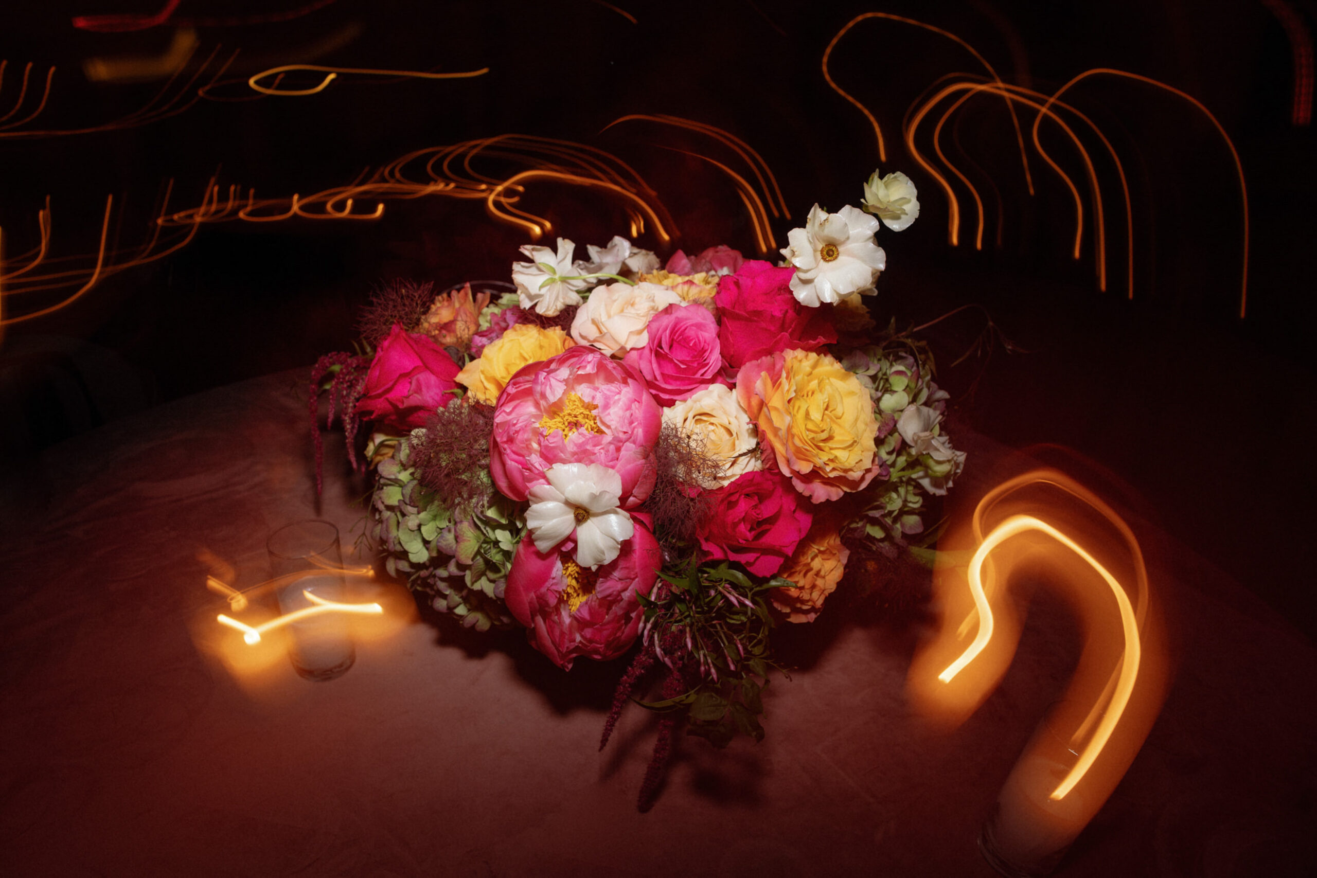 Floral arrangement at wedding reception shutter drag