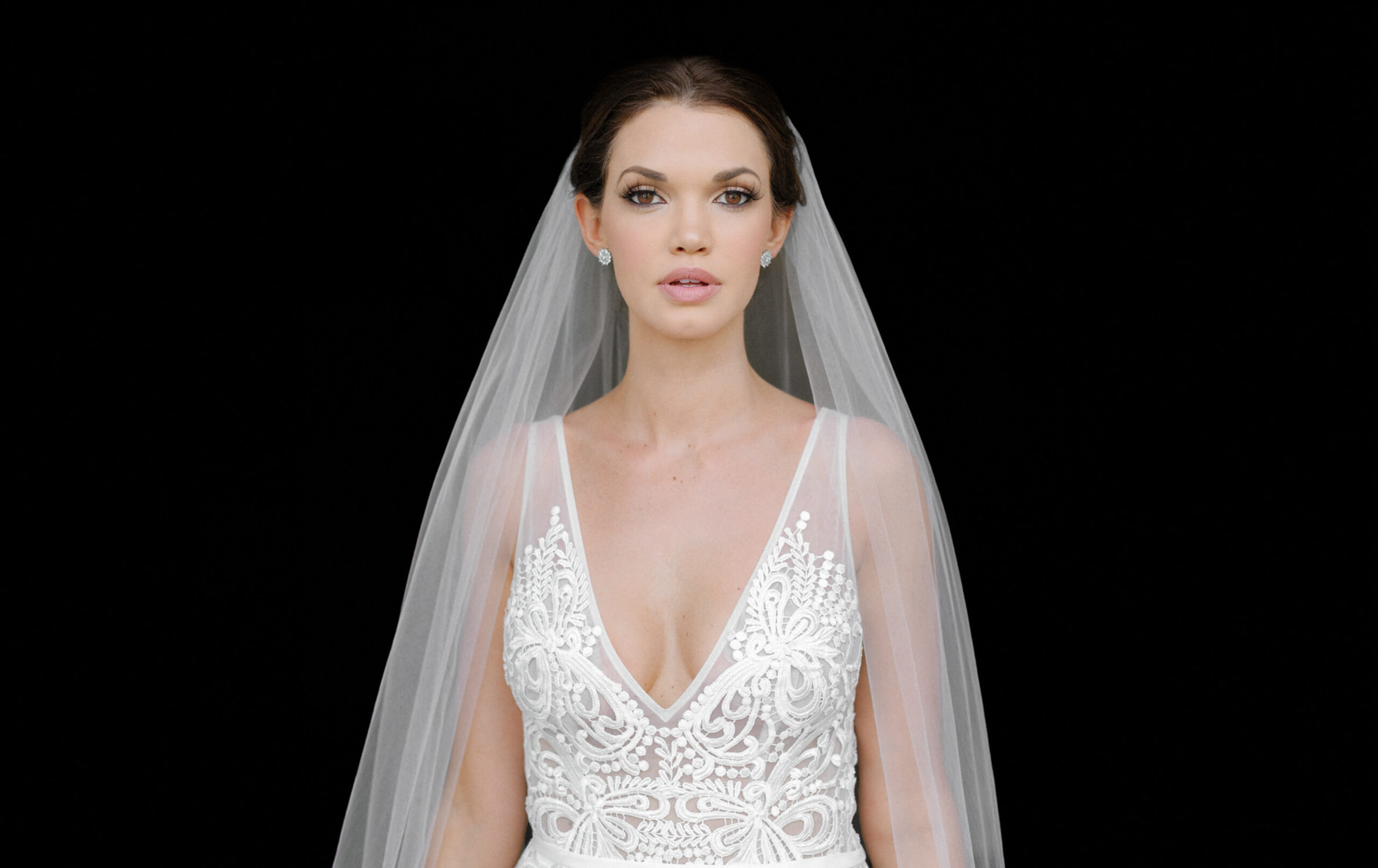 Bride in veil and what to wear under wedding dress